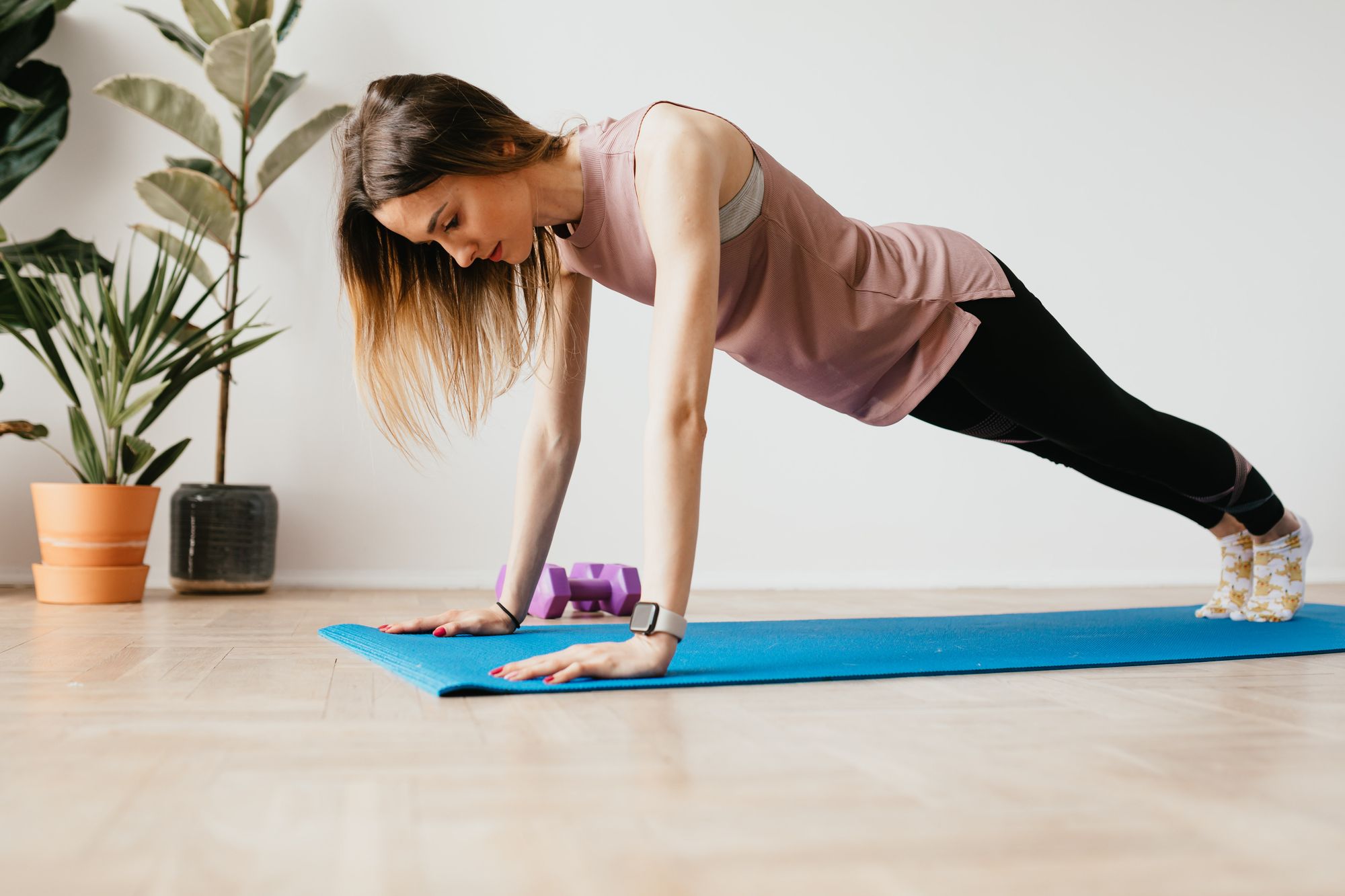 Weight loss through yoga for beginners with plank pose