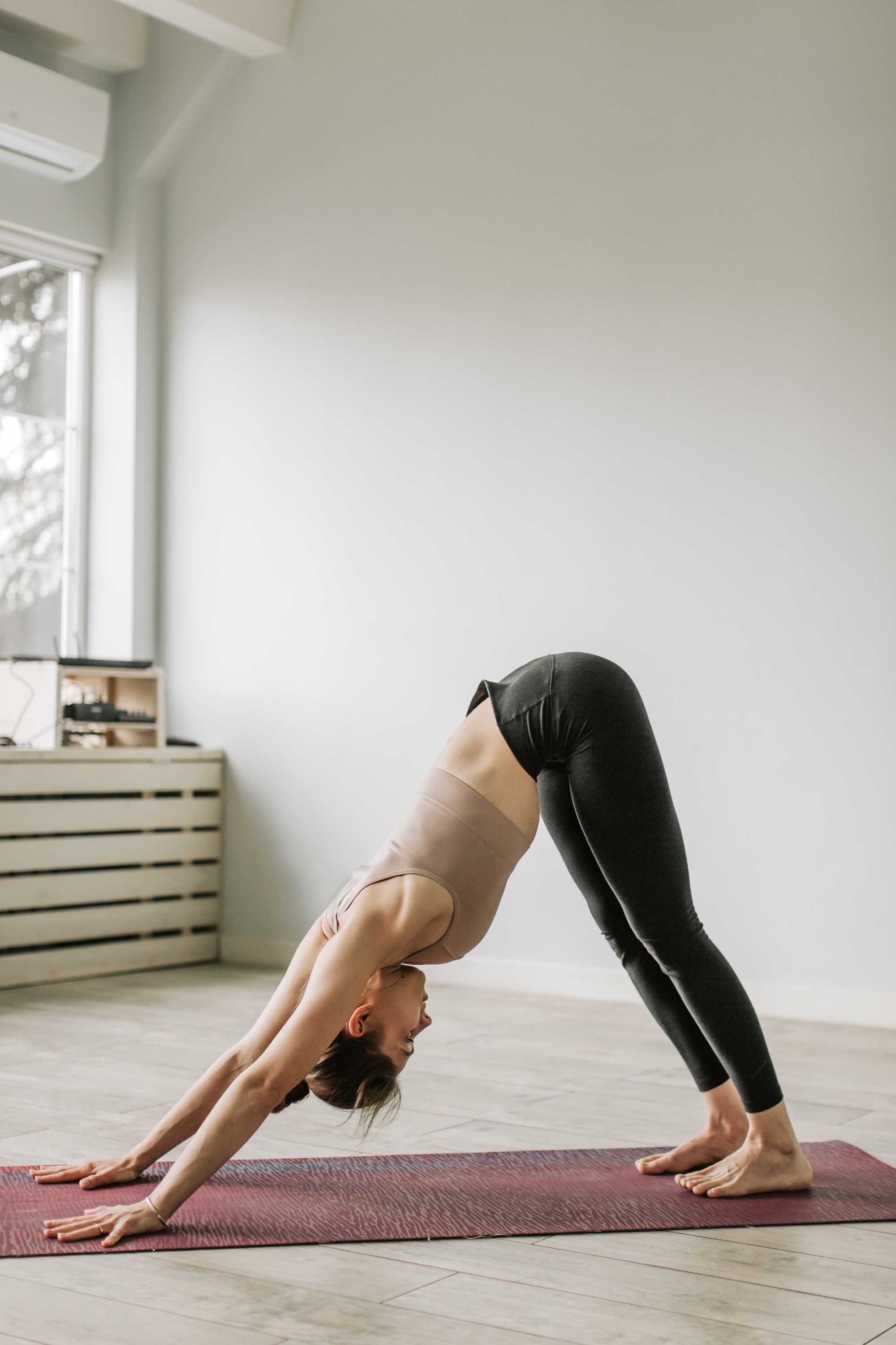 Downward facing dog pose for morning yoga routine for beginners