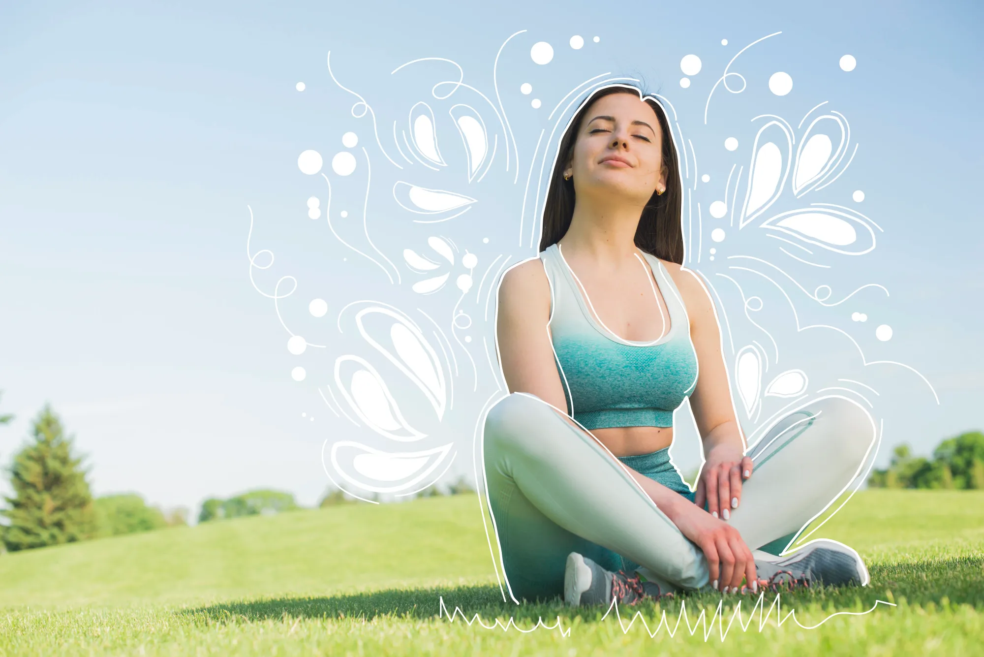 A woman sitting on grass practicing mindfulness to improve memory