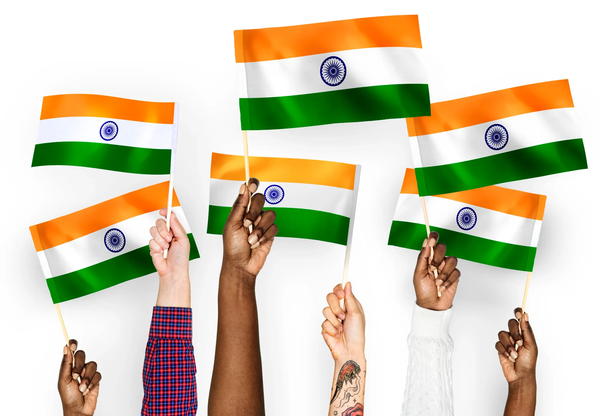 Hands waving the Indian flag on Gantantra Divas