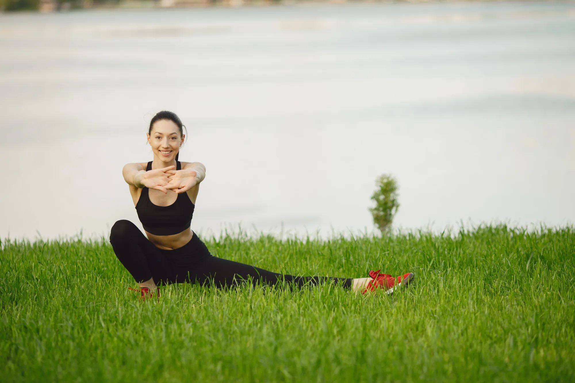 Woman combining exercise and meditation to stay mindful while doing workout