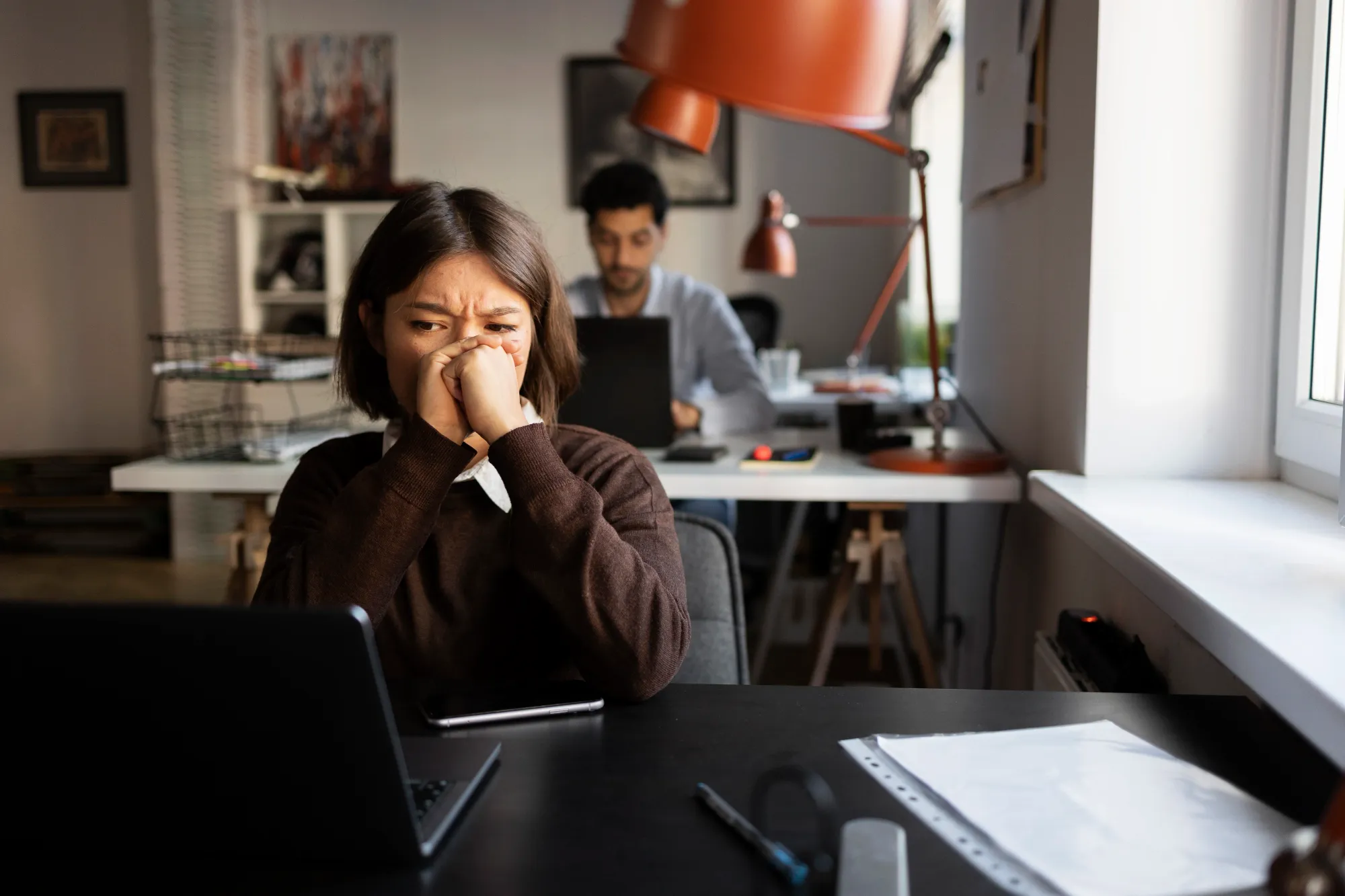 A woman facing anxiety at work making it important to take that much needed break