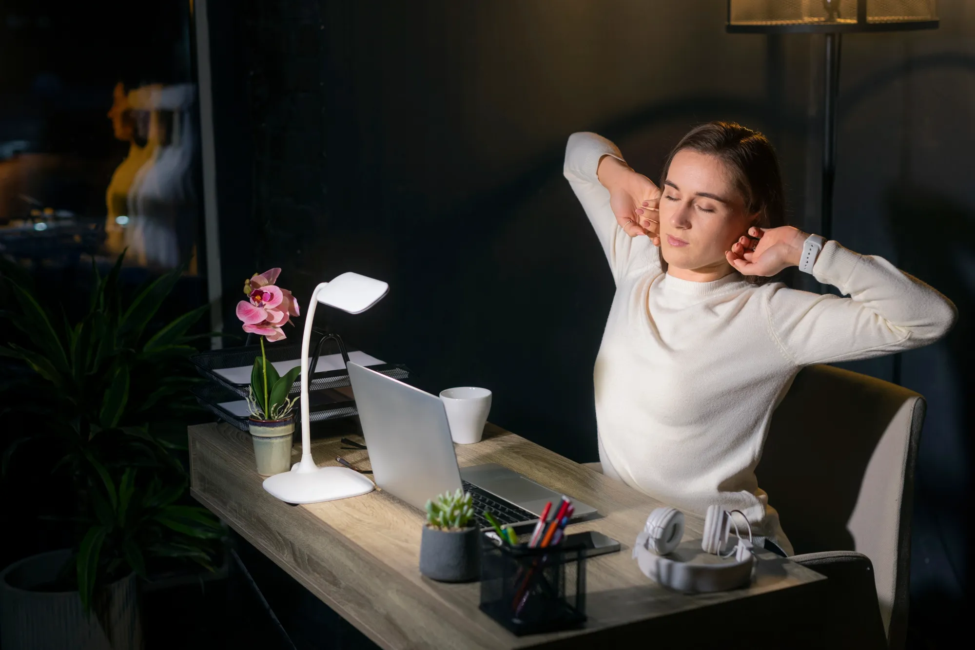 A woman doing continuous sitting which hinders staying fit in the long run