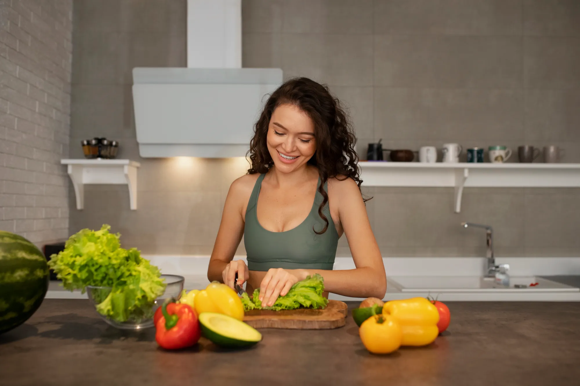 A woman eating better by taking small steps to prepare a full meal