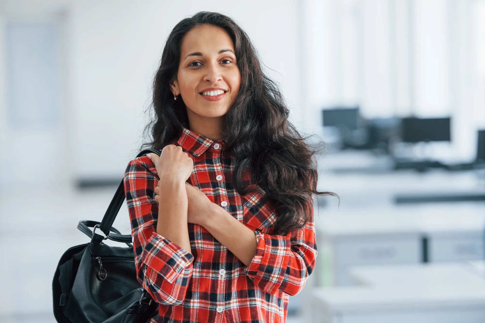 A confident girl with black bag having no exam fear