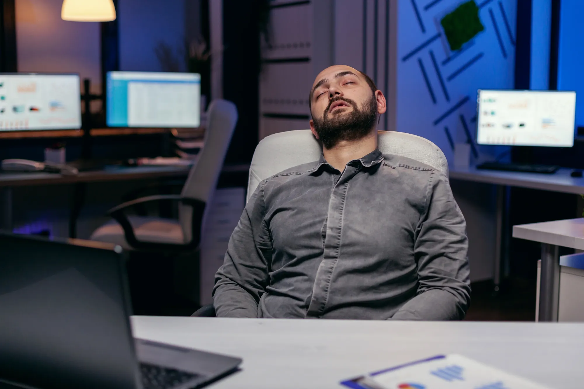 An exhausted man taking nap after sleeping badly last night