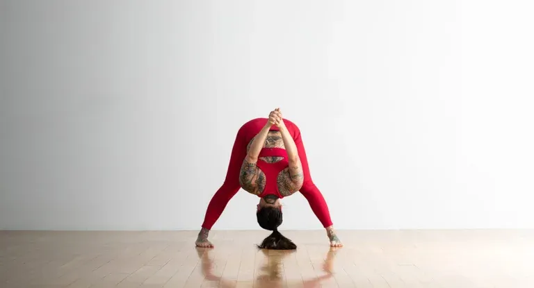 A woman doing yoga poses for sleep