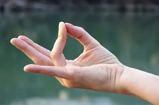 Meditation hand positions for promoting weight loss