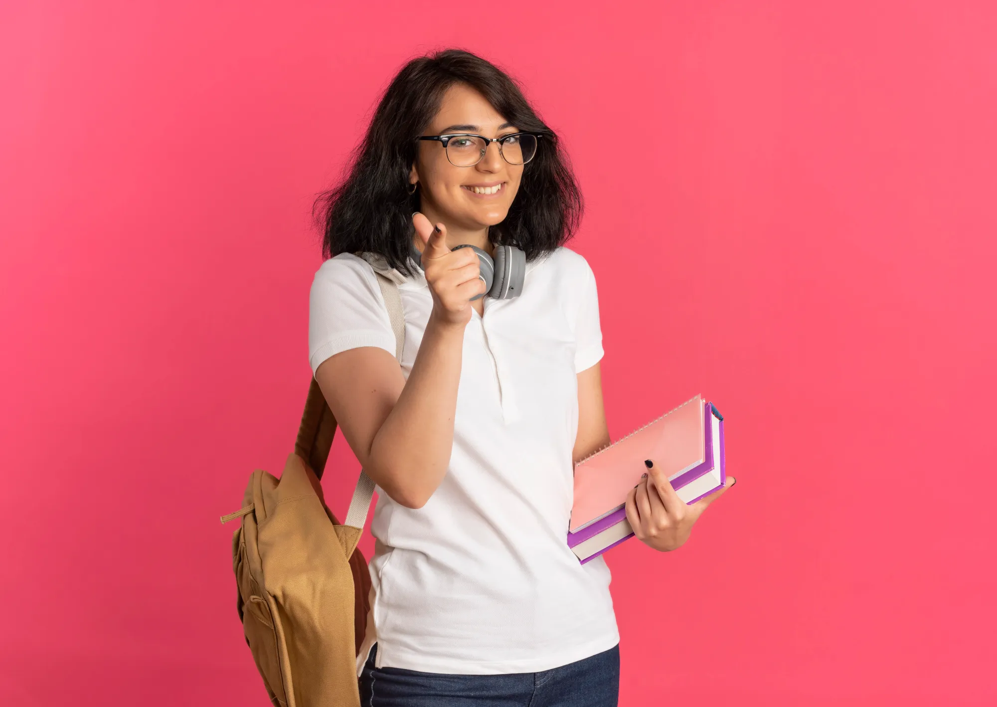 A student with books and bag, feeling confident after meditating