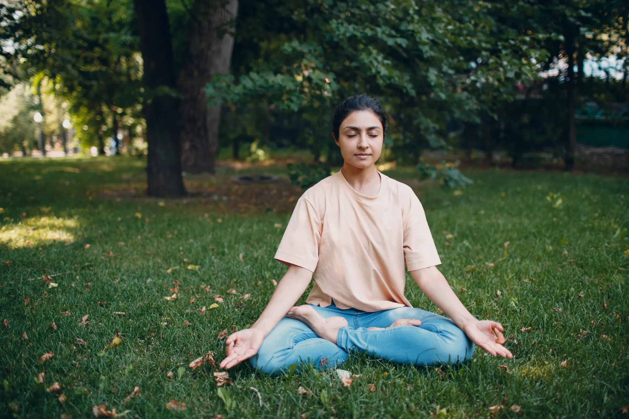 Yoga day images: An Indian woman doing meditation to end her yoga practice on International Yoga Day