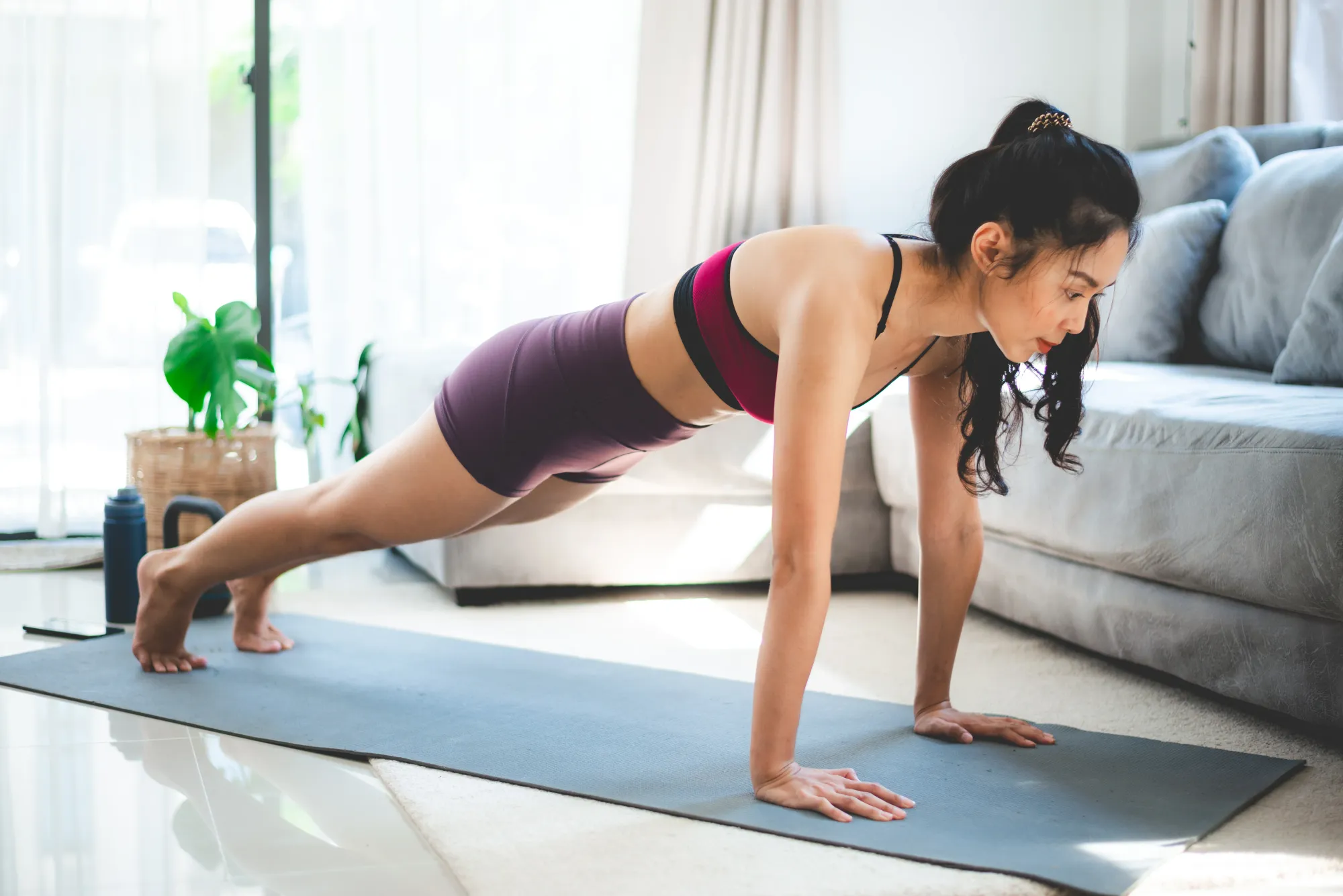 Surya Namaskar images: A woman doing Stick pose