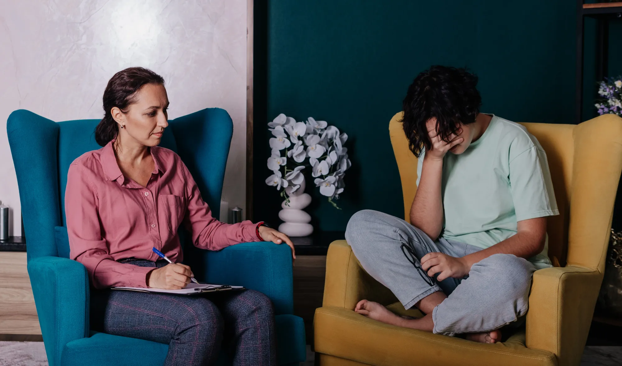 A man talking to his therapist to stop overthinking every little thing