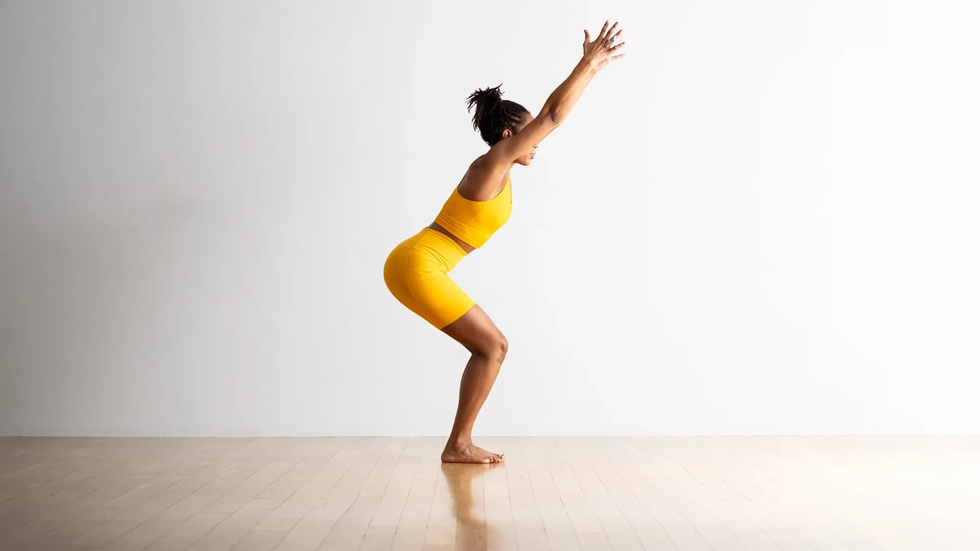 Chair Pose (Utkatasana) - Easy yoga pose for strength in standing position yoga series