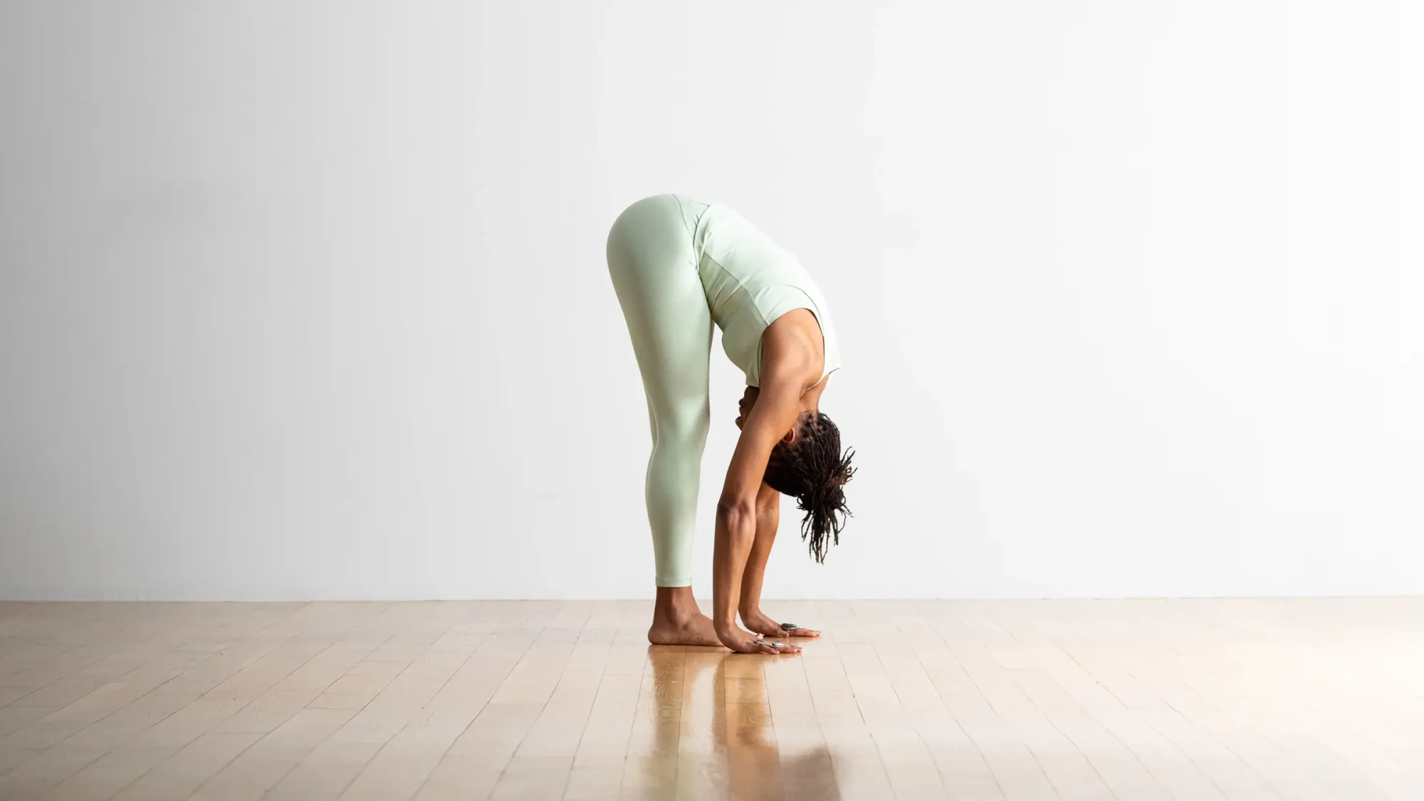 Standing Forward Bend- Basic yoga asana with names for hamstring stretch and relaxation
