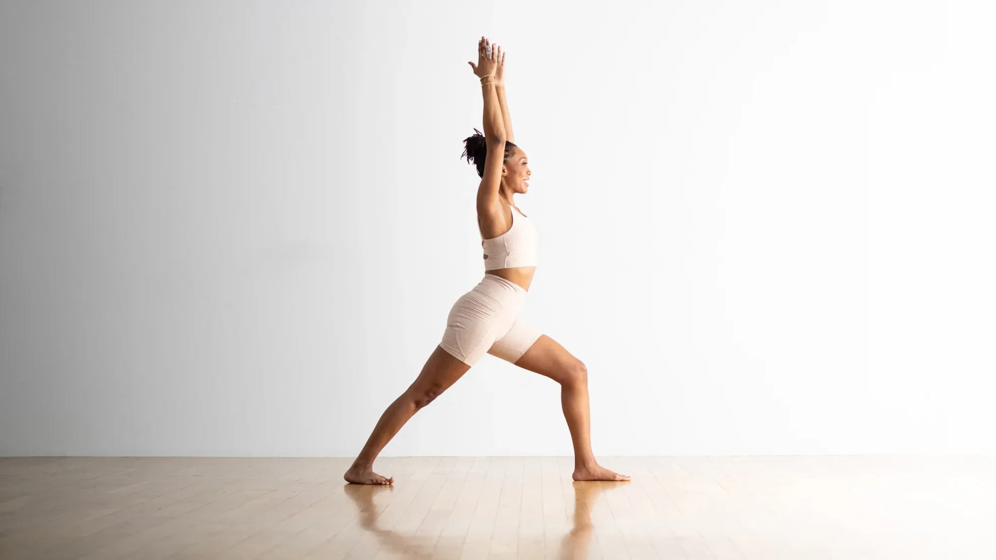 Warrior I Pose (Virabhadrasana I) - Standing yoga pose with names for strength