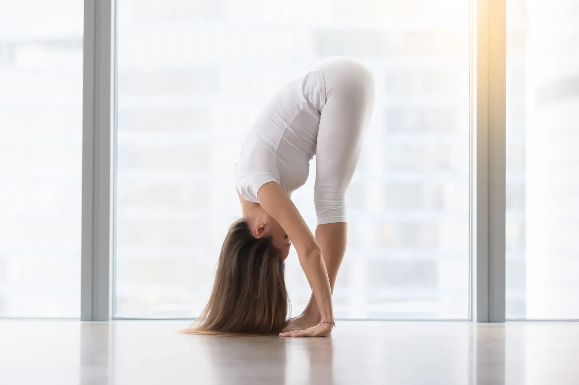 Uttanasana (Standing Forward Bend) yoga for hair loss